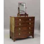 A George III mahogany and crossbanded chest, fitted with two short and three long drawers, on