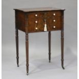 A George IV figured mahogany side table with projecting corners, the two drawers with bone handles