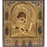 An early 20th century and later Moldavian School gilded and painted icon depicting the Virgin and