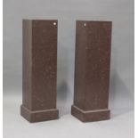 A pair of modern simulated marble pedestals, height 106cm, width 31cm.Buyer’s Premium 29.4% (
