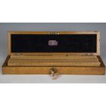 A late Victorian oak cased set of boxwood technical drawing rules by E. Saunders of Oxford, width of