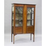 An Edwardian mahogany display cabinet with satinwood crossbanding, on tapering legs, height 169cm,