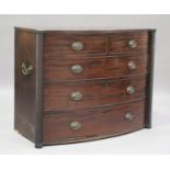 A late George III mahogany bowfront chest, the two short and three long drawers flanked by