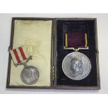 An Indian Mutiny Medal, without bar, to 'M.W.Sandys' and a Victoria Empress of India Medal 1877 (