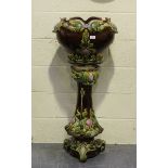 An Art Nouveau pottery jardinière and stand, height 111cm (faults).Buyer’s Premium 29.4% (