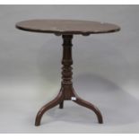 A 19th century mahogany tip-top wine table, raised on a turned column and tripod legs, height
