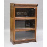 An early 20th century Globe Wernicke style oak three-section bookcase, height 136cm, width 88cm,