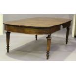 A 20th century Continental stained pine dining table, on turned tapering legs, together with