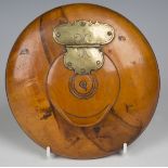 An early 19th century Continental fruitwood circular table snuff box with brass hinged lid, diameter