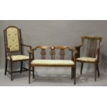 An Edwardian walnut two-seat salon settee, height 73cm, width 107cm, depth 50cm, together with two