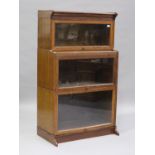 An early 20th century Globe Wernicke style oak three-section bookcase, height 147cm, width 87cm,