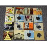 A collection of 7-inch singles and EPs, including releases by Eddie Cochran, Buddy Holly, Elvis