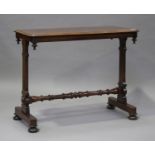 A Victorian mahogany centre table, raised on shaped supports and turned feet, height 73cm, width