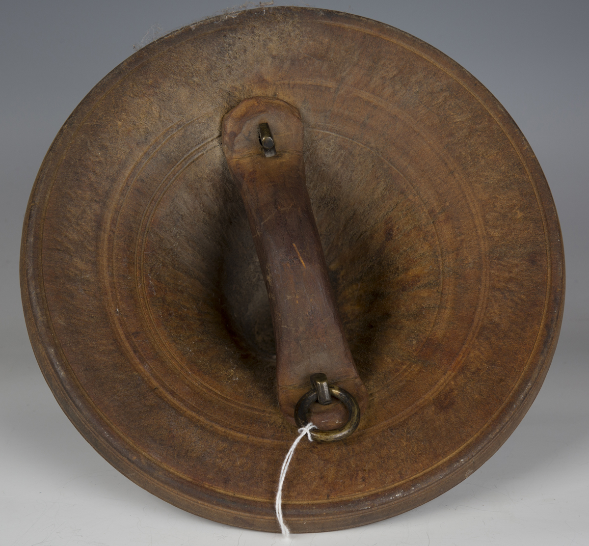 A late 19th century Omani rhinoceros hide buckler of circular shaped umbonate form with applied - Image 2 of 5