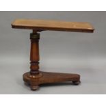 A late Victorian mahogany adjustable reading table, height 72cm, width 88cm, depth 45cm.Buyer’s