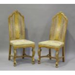 A pair of early 20th century Queen Anne style walnut side chairs with carved decoration, on cabriole