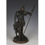 A 20th century dark brown patinated cast bronze figure of a Roman soldier, height 42cm, together