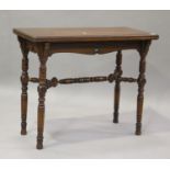 A late Victorian walnut fold-over card table by Gillows, raised on ring turned legs, height 76cm,