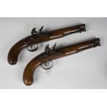 A pair of early 19th century flintlock officer's pistols by Henry Nock, London, with sighted