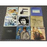 A collection of mainly 1970s LP records, including albums by Bob Dylan, The Eagles and Dire