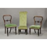 A pair of William IV mahogany dining chairs with carved decoration, height 87cm, width 45cm,