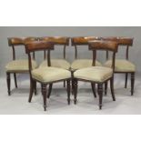 A set of six William IV mahogany bar back dining chairs with carved rosette decoration, the
