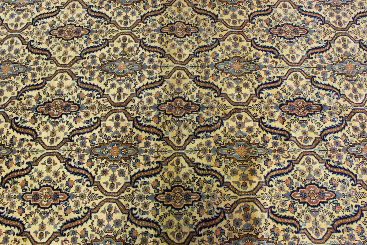 An Indian carpet, mid/late 20th century, the ivory field with an overall floral lattice, within a - Image 5 of 5