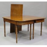 A George III mahogany dining table with single extra leaf, on turned legs, height 73cm, extended