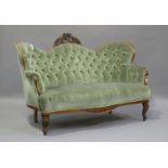 A Victorian mahogany showframe settee, upholstered in buttoned blue velour, height 108cm, width