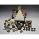 A collection of school attendance medals, including a group of three London County Council medals,