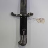 An 1887 pattern Martini-Henry MkI sword bayonet, blade length 46.5cm, with chequered leather grip
