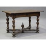 A late 17th/early 18th century Continental walnut side table, fitted with a drawer, raised on turned