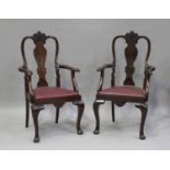 A set of eight early 20th century Queen Anne style mahogany dining chairs with drop-in seats, on