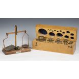 A collection of boxed mid-20th century graduated scientific weights, together with two sets of