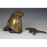 A late 19th/early 20th century brass Merryweather type fireman's helmet with dragon decorated comb