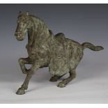 A 20th century South-east Asian verdigris bronze model of a horse, height 30cm.Buyer’s Premium 29.4%