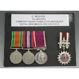 A group of three medals, comprising 1939-45 Defence Medal, War Medal and Army Long Service and