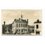 A large collection of postcards, including photographic postcards titled 'Town Hall, Staines', '