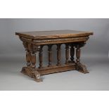 An 18th century Continental walnut draw-leaf dining table, the rectangular top above a carved