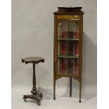 A Victorian mahogany hexagonal wine table, on a turned column, petal feet and castors, height