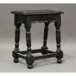 A late 17th century stained oak joint stool, on turned and block legs, height 52cm, width 46cm (