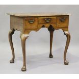 A 19th century George II style oak lowboy, fitted with three drawers, on cabriole legs, height 71cm,