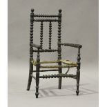 A Victorian ebonized bobbin turned child's chair, height 70cm, width 39cm.Buyer’s Premium 29.4% (