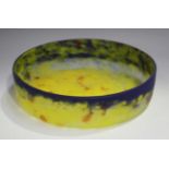 A Muller Frères Lunéville circular glass bowl, early 20th century, of mottled yellow colouring