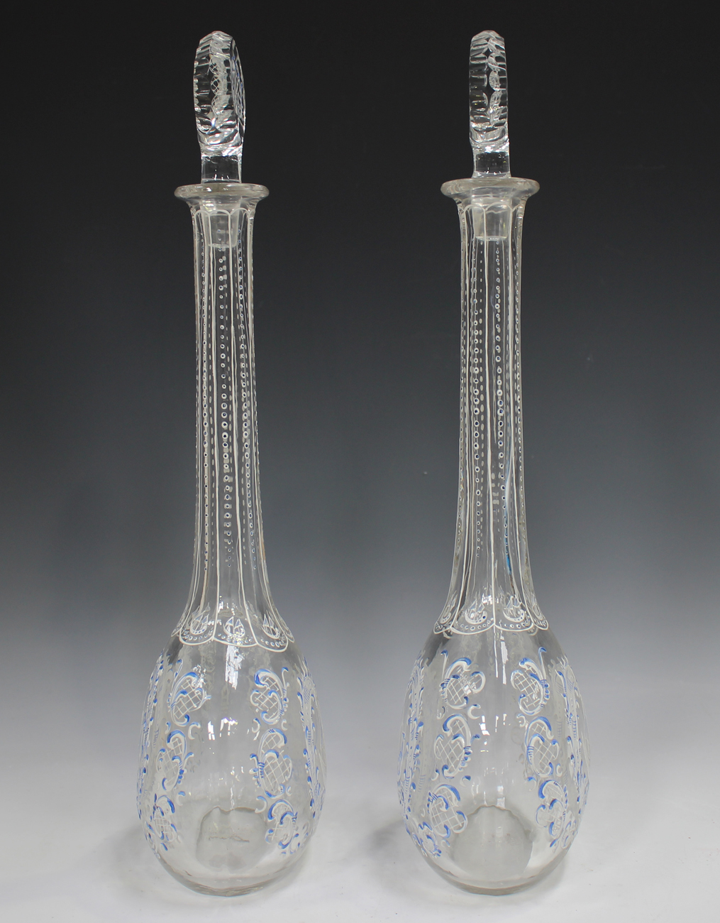 A pair of enamelled glass decanters and stoppers, 19th century, in Beilby style, each flattened - Image 7 of 7