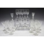 A collection of glassware, early 20th century and later, including a part suite of eleven claret and