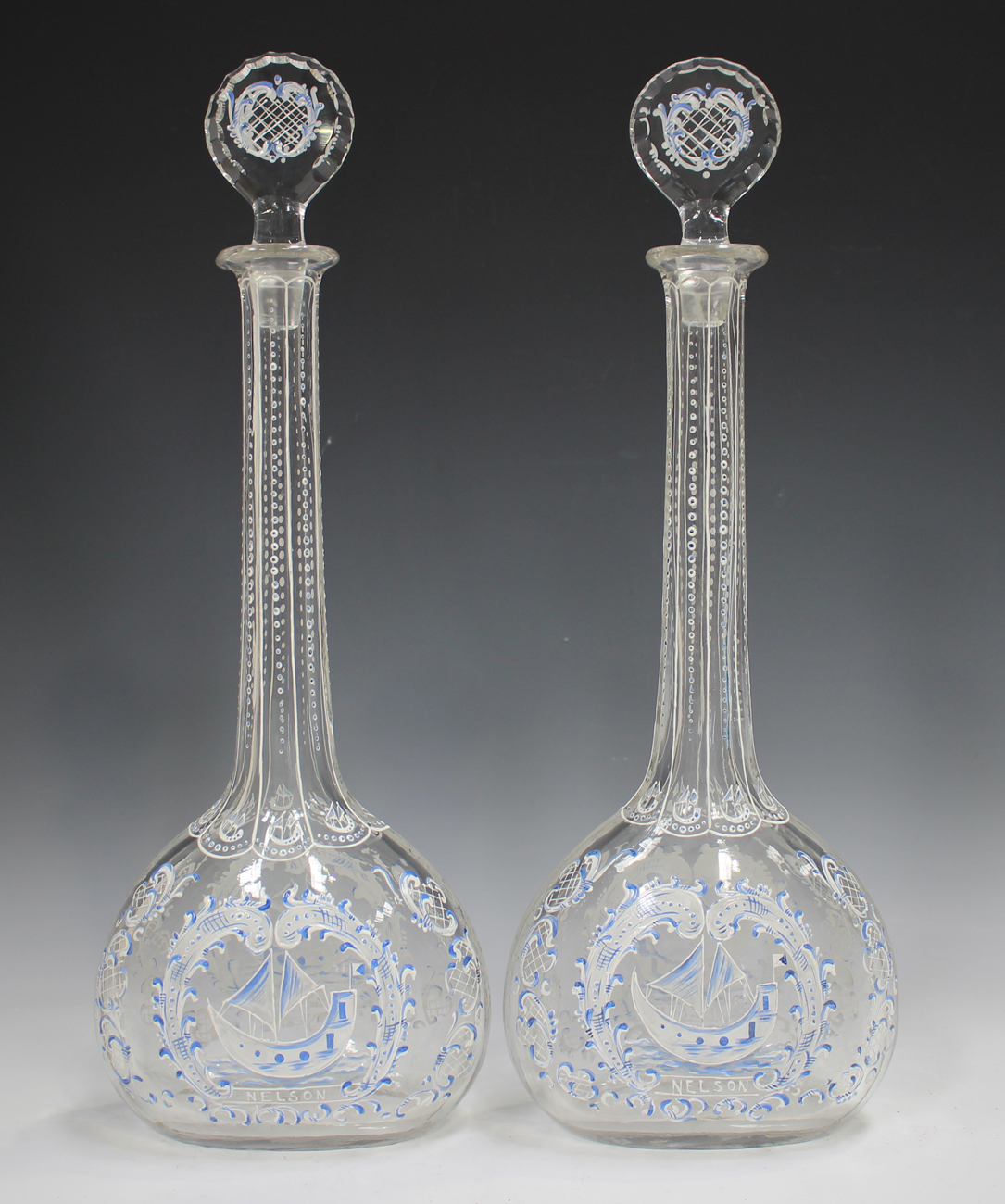 A pair of enamelled glass decanters and stoppers, 19th century, in Beilby style, each flattened - Image 6 of 7