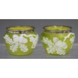 A pair of English cameo glass silver mounted salts, circa 1885, each yellow shouldered body overlaid