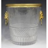 A Continental cut glass and ormolu mounted champagne bucket with an engraved fruiting vine border