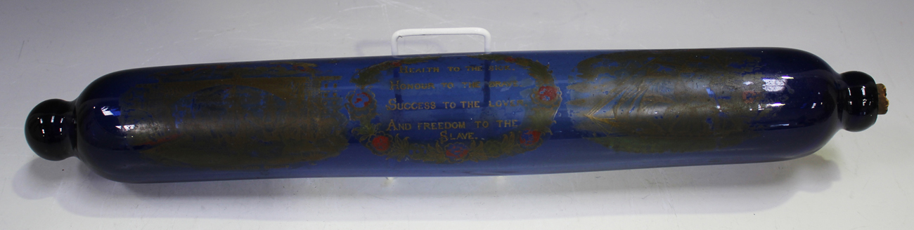 A Bristol blue glass rolling pin, 19th century, decorated with the 'Sunderland Bridge' and a sailing